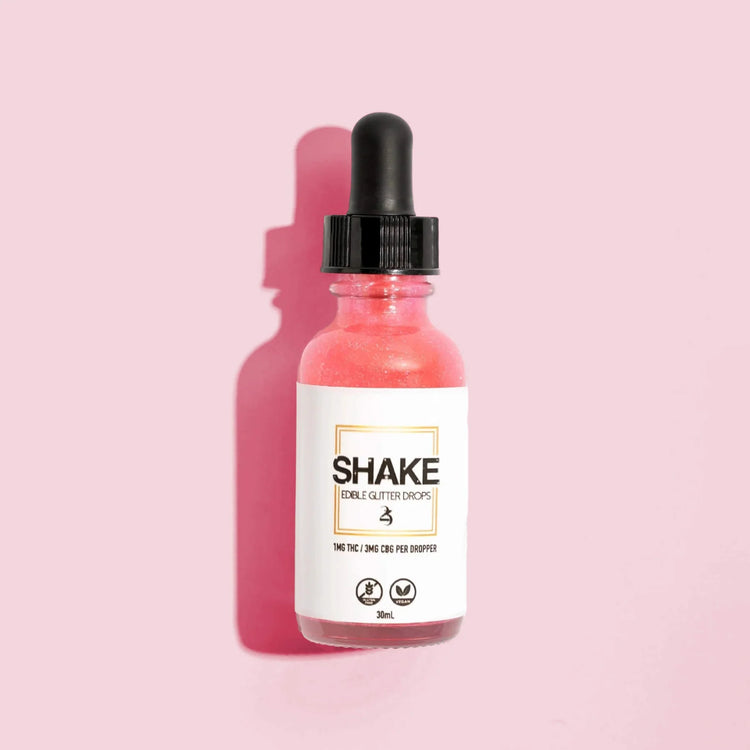 Bottle of 'SHAKE' on a pink background