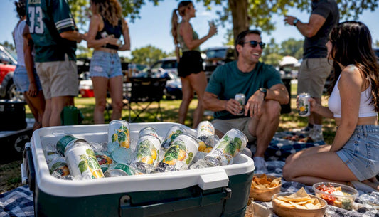 Cooler filled with THC drink cans at tailgate