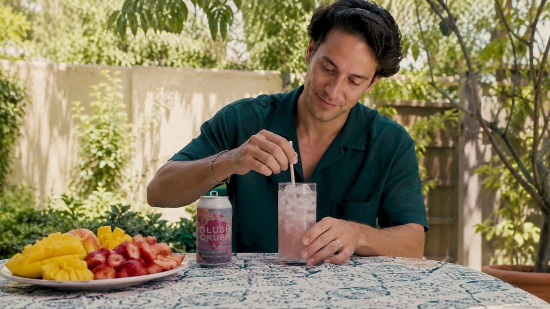 Person setting timer beside hemp beverage can
