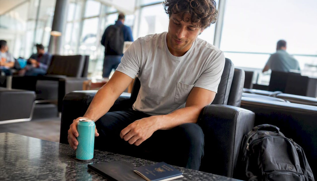 Hemp THC drink on airport cafe table