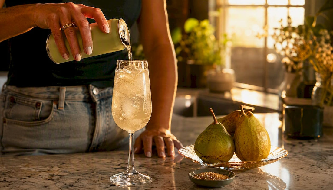 Glass being poured pear THC sparkling beverage