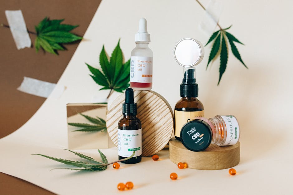 Flat lay of colorful THC gummies next to sparkling cannabis drinks on a pastel background