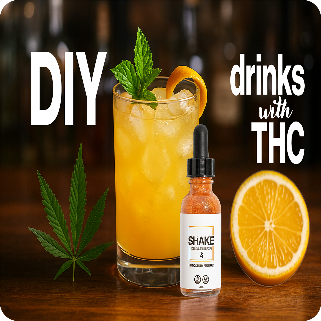 Orange cocktail with ice, mint, and orange slice, accompanied by a bottle labeled 'SHAKE' and a cannabis leaf on a wooden surface.