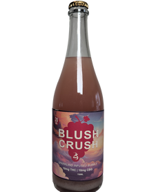 Bottle of 'Blush Crush' sparkling THC infused bubbly with a colorful label on a white background.