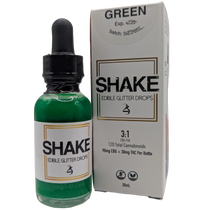 Green Emerald SHAKE edible THC infused glitter drops bottle with packaging on a white background